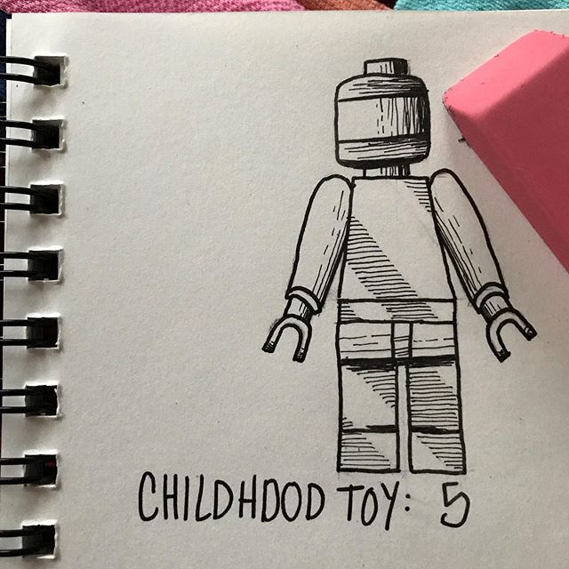An ink picture of a lego minifigure with a blank face